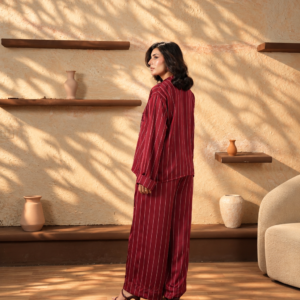 Full length editorial stance in dusty rose ensemble